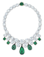 AN EXCEPTIONAL EMERALD AND DIAMOND NECKLACE Designed as a line of graduated old European and cushion-shaped diamonds alternating with baguette-cut diamonds, the front suspending a fringe of emerald drops, flanked by cabochon emeralds, accented by a sugarl