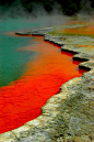 The Champagne Pool;  It was formed by a hydrothermal eruption 900 years ago. The crater has a diameter of about 213 feet and the 160 degree Fahrenheit geothermal pool is 230 feet deep. The colours are in part formed by sulfur and arsenic. The waters are t