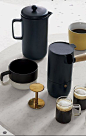 black magic. Porcelain French press steeps in modern style. Remove stainless steel plunger and body becomes perfect pitcher to pour freshly-pressed coffee. An edgy update to the classic.