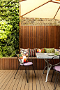 Discover city garden ideas on HOUSE - design, food and travel by House & Garden. This stylish all-weather area uses matchboard planks, that flow in to a bench and wall. 