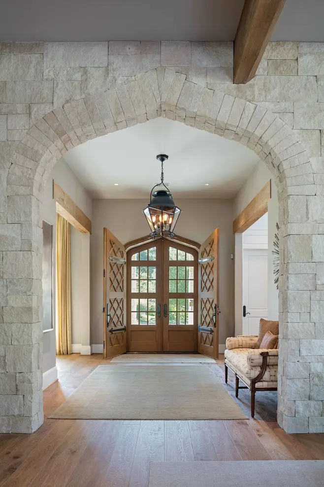 Entryway - traditional medium tone wood floor entryway idea in Houston ...