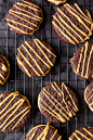 Dark Chocolate Peanut Butter Sandwich Cookies: a fluffy peanut butter frosting sandwiched between two brownie-like cookies.