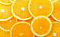 高清晰被切开的脐橙橘子片壁纸封面大图