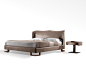 Pochette by Giorgetti : A programme of double beds available for mattress in the sizes 180 and 200 cm in width. The headrest and footboard frame is in honeycomb board with the lateral profiles in solid and the lateral sides …