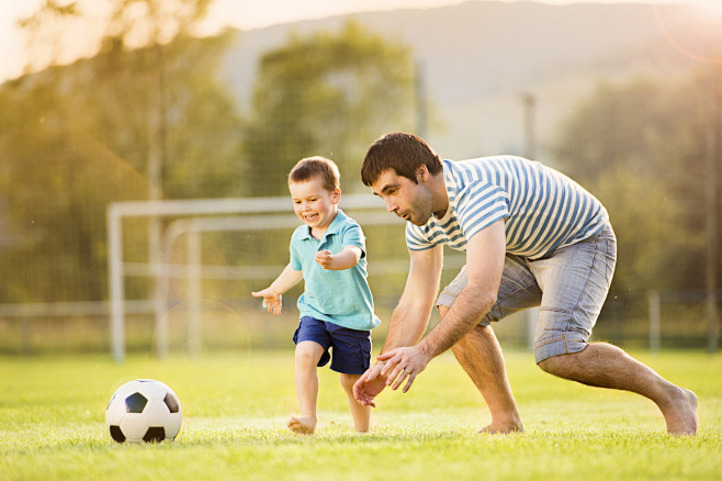 Father and son playi...