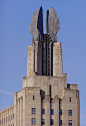 The aluminum-winged crown of the Times Square Building in Rochester, New York, is an icon of Art Deco architecture. Image © Wikipedia user Marduk