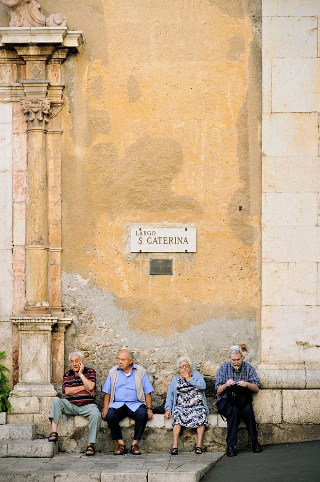 Four people sitting ...