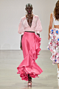 Image may contain Clothing Apparel Human Person Dress Alek Wek and Skirt