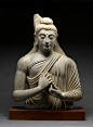 巴基斯坦（犍陀羅風格）石雕造像
公元三世紀，佛陀宣講
片岩，高71.1x53.3x22.9公分
沃特斯藝術博物館藏 ​​​