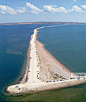 The length of the #Fedotova Spit is more than 20 km (12.5mi). It lies between the #Azov Sea and the Utlyuks'kyi estuary. On the basis of Fedotov Spit is Kyrylivka - a small town in the south of Zaporizhia Oblast, #Ukraine, - http://www.theworldgeography.c