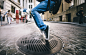 Dancer performing tricks on a manhole in Manhattan by Cristian Negroni on 500px