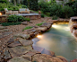 Natural Waterfall & Swimming Pool : A Memorial area family commissioned us to create a natural swimming pool in their back yard. The family already had a standard pool on premises, but it was isolated in an area of the yard not