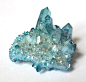 fuckyeahcrystals:

Aqua aura quartz is formed when gold is fused with clear quartz, resulting in a permanent blue coloring. It helps protect and shield oneself from psychological and psychic attacks. It also activates and balances all chakras, especially 