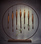 这个「圆」屏风设计来自广州美术学院毕业生林月，将拱门和屏风造型结合，又混搭了富有质感的金属与柔韧的竹，让人眼前一亮。