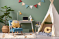 Creative composition of stylish and cozy child room interior design