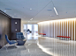 Tour Time Inc.'s Vibrant New Headquarters by Studios Architecture : A coffee bar’s table and chairs are by Charles and Ray Eames. Photography by Garrett Rowland.