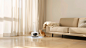 ls7623_Xiaomi_sweeping_robot_in_a_room_a_cat_on_the_sofa_solid__da57f560-38c9-4cb6-bc5e-6a77812b6610