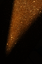 黑夜中的金色粒子背景图片