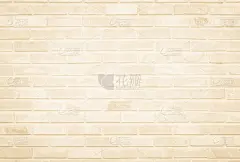 空背景宽奶油色砖墙纹理。旧棕色砖墙混凝土或石材自然图案，壁纸石灰石抽象地板/网格不平的室内岩石。家庭