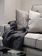 luxurious cushions and throw in soft shades of grey and mulberry | Boscolo - Detached Family Home - Living Room: