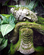 Buddha statue in a garden: 