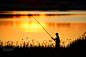 Fisherman fishing at sunset by Eugene Gurkov on 500px