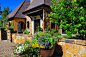 French Country Home in the Pines - Mediterranean - Exterior - Denver - by Designscapes Colorado Inc.