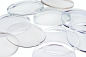 clear glass round ornament on white surface