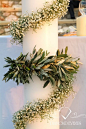 Wedding #candle #decorated with olive #leaves and gypsophilia. See more ideas on www.diamondevents.gr: 