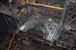 KSC-2015-3644 : A view from above in the Vehicle Assembly Building at NASA's Kennedy Space Center in Florida, shows a  325-ton crane lifting the first half of the K-level work platforms up for installation in High Bay 3. The platform will be secured into 