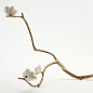Unique bronze table branch with porcelain blossoms by David Wiseman, 2008. (=)