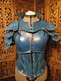 neimhaille:

fabricatedgeek:

Women’s Leather Armor- Blue Jayby SavagePunkStudio
I’m loving the practical female armor that’s also just flat out gorgeous! 

So what makes this practical for the ladies? or in general in fact? The nipping in at the waist an