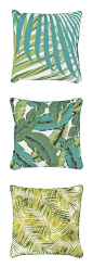 Super Cool Retro Palm Pillows! Set a tropical vibe in almost any space with these retro-inspired fabric prints.