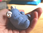 Light blue cutie horns : Needle felted sculpture. He is very happy and cute. And could not help smiling at the sight of him. Eyes glass painted manually. It is weighted metal pellets. Very cosy sits in a hand! 