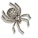 Lot 9 – A diamond and ruby spider brooch, circa 1930