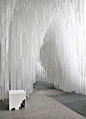 drawing from the technical lightness and luminescence of the COS spring summer 15' collection, snarkitecture transform the space through the methodical layering of white fabric that hangs from the ceiling to the floor.