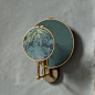 Circle blue grey, wall sconce ensemble, Sander Bottinga Handmade in brass, leather, wood and hand printed and painted linen. A dimmer is inlaid with leather. Also possible without a dimmer Dimensions: H 35 x W 27 x D 23 cm The design artwork is