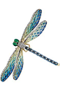 A Diamond and Enamel Dragonfly Brooch  Designed as a dragonfly with polychrome enamel head and body, plique-a-jour enamel wings, in various shades of blue, green and yellow, and accented by small round diamonds, mounted in silver and 18k gold