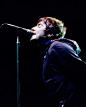 Liam Gallager performs with Oasis at the Fiddlers Green in Englewood Colorado on May 17 2001