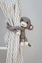 Monkey curtain tie back pattern by Caitie Moore : 
This is a DOWNLOADABLE PDF pattern with all the instructions you need to create an adorable cheeky monkey that can be used to tie back curtains in a nursery.