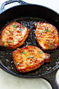 Honey garlic pork chops in a skillet, ready to be served.