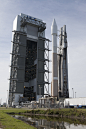 KSC-2015-3455 : A United Launch Alliance Atlas V rocket with a single-engine Centaur upper stage rolls out of the Vertical Integration Facility at Cape Canaveral Air Force Station's Space Launch Complex 41, ready to boost an enhanced Orbital ATK Cygnus sp