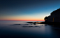 一般2880x1800自然日落景观海岸岩石天空晴朗的天空建筑剪影
