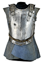 A cuirass Europe, mid-17th Century  Breast-plate ribbed at the centre, with blow on the right, a row of brass rivets at the margins. Back-plate with blow, decorated with bands and rivets; provided with straps cuirassed with iron plaques.