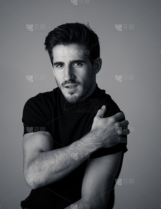 Portrait of young handsome manly man looking sexy