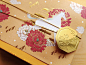 E-g-sain 2014 Chinese New Year : Although Chinese New Year has come and gone, this design is definitely one 
to take a look at. Created by MURA, much care has been taken to package 
each individual element in the box. The elaborate illustrations that are 