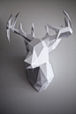 If you're looking for a non traditional holiday DIY (that you could totally leave up year round), look no further than this stunning paper reindeer. It should take you about 3 days (on and off) and come in under $30, so get cutting!