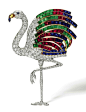 A clip in the shape of a flamingo, by Cartier, 1940, features rubies, sapphires, emeralds, and diamonds, many from other pieces of jewelry in the Duchess of Windsor's collection.