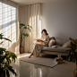 ls7623_A_asian_women_sitting_on_a_sofa_is_reading_with_a_book_w_c0c09511-cf1e-44a4-828a-ea83a4e7c7a3