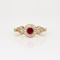 Ruby and Diamond Halo Vintage-Inspired Milgrain Ring in 14k Yellow Gold (4mm)  | Blue Nile : Inspired by vintage jewelry, this sophisticated 14k yellow gold ring features a milgrain halo with pavé-set diamonds that frame a beautiful round-cut ruby. This p
